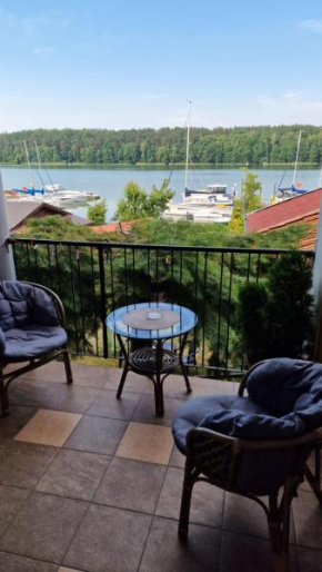 Pokój na jezioro Mikolajki